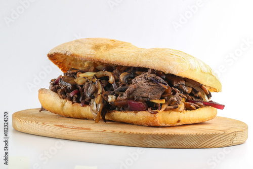 Tasty beef steak onion mushroom sandwich in a ciabatta 