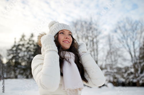 happy woman outdoors in winter © Syda Productions