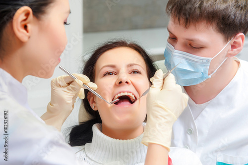 Female patient with open mouth photo