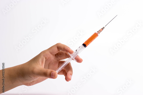 Syringe in hand