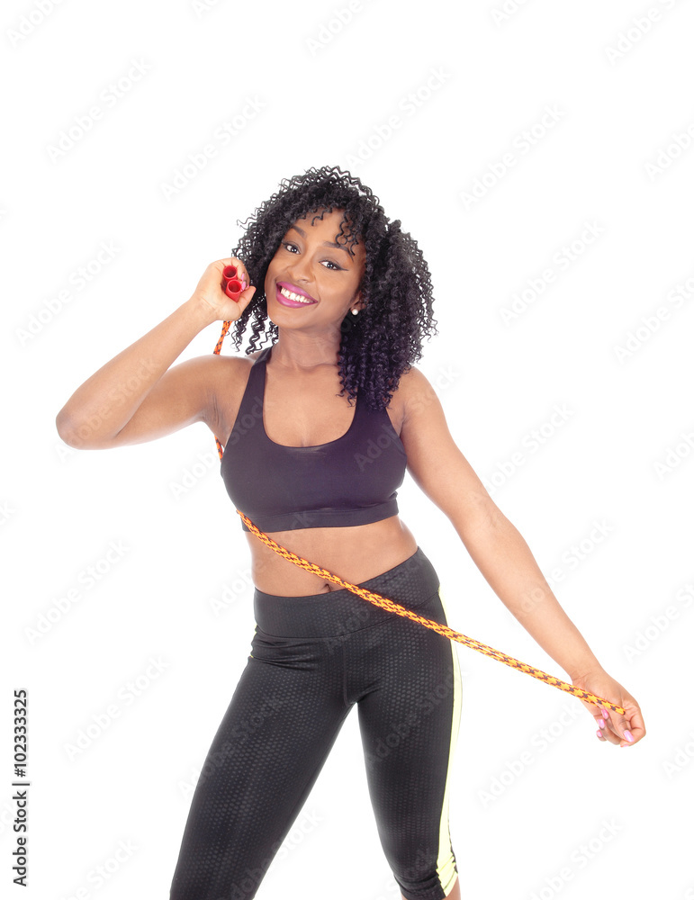 African American woman with exercise rope. African American woman with exercise rope.