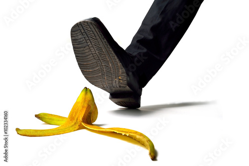 man about to step on banana peel
