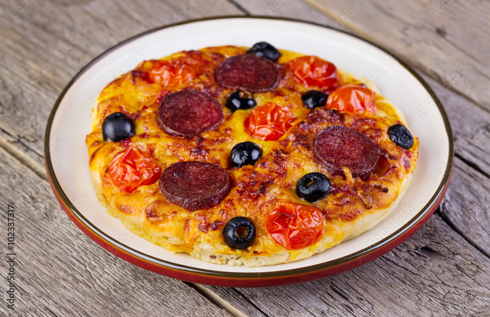 hot homemade pizza heart with cheese, tomatoes, olives hot homemade pizza heart with cheese, tomatoes, olives