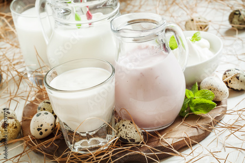 Dairy products: milk and yogurt in jars, cream and fermented bak
