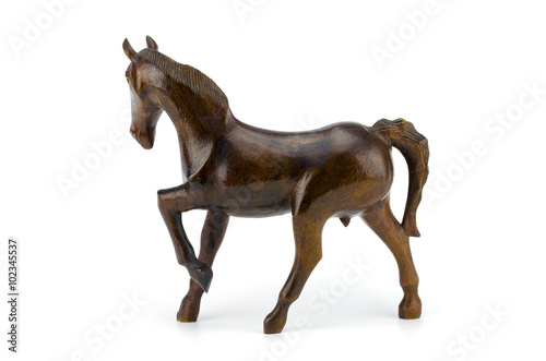 Beautiful sculpture of horse made of  wood isolated on the white