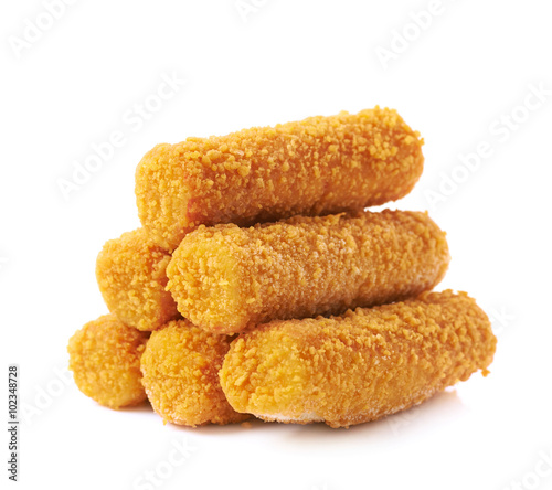 Pile of breaded crab sticks isolated