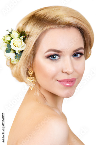 beauty portrait of a beautiful blonde with beautiful make-up isolated on white.