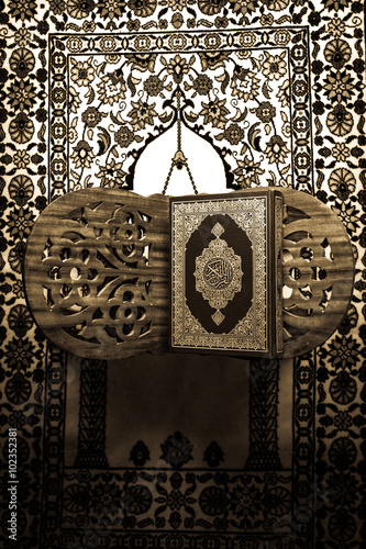 Koran - holy book of Muslims,vintage style filtered photo photo