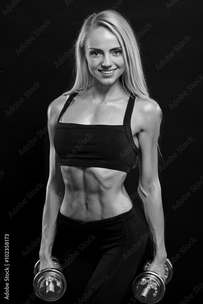 woman lifting dumbbells woman lifting dumbbells