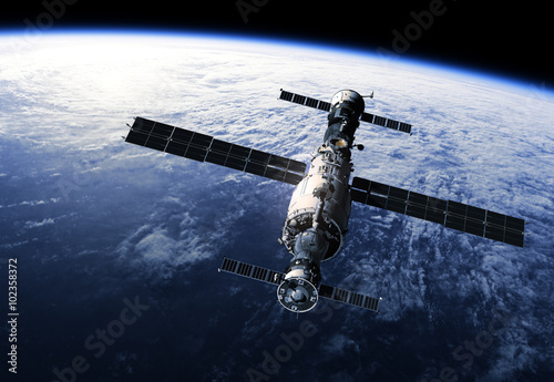 Fototapeta Naklejka Na Ścianę i Meble -  Space Station Orbiting Earth