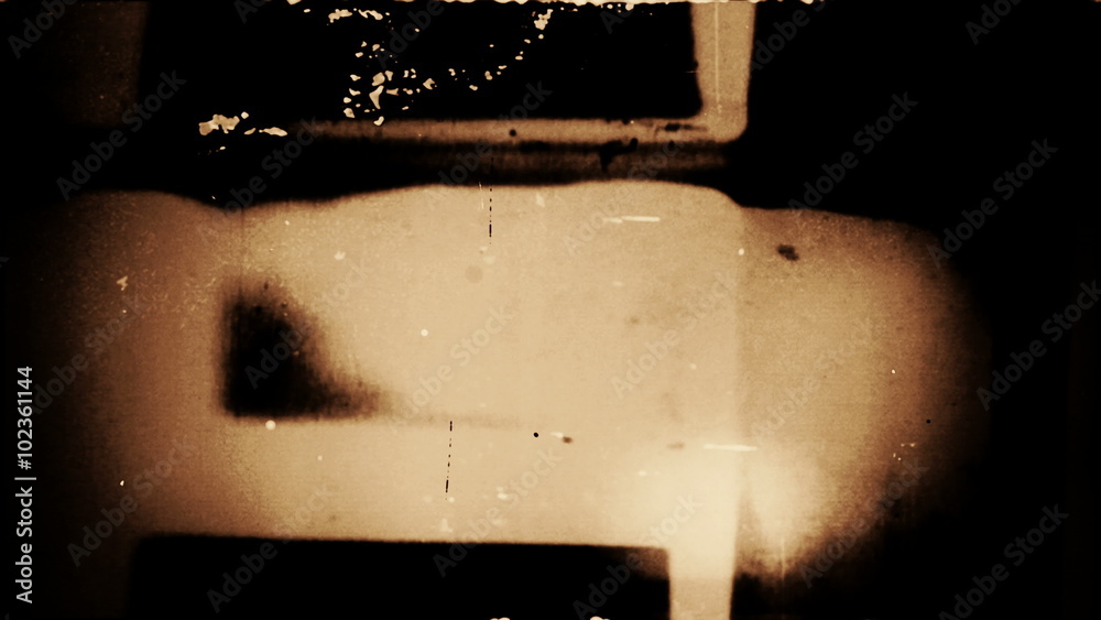 Film FX1009: Dust and scratches on old film leader (Loop).