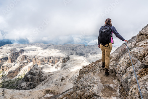Hiker in Dolomites of Italy