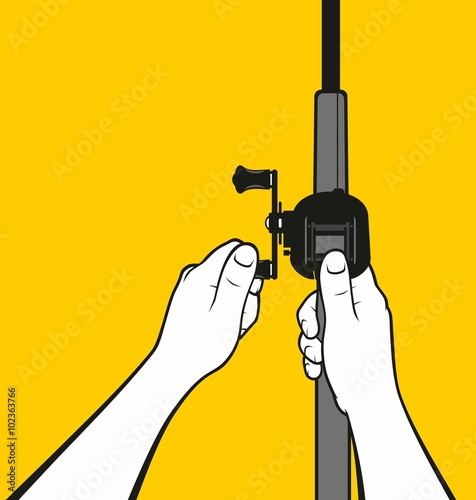 Hands using fishing rod