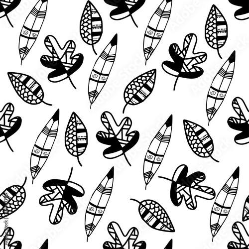 Seamless pattern with black and white graphical leaves. 
