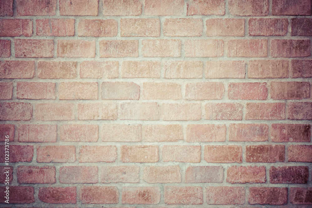 Fototapeta premium vintage brick wall background with vignette