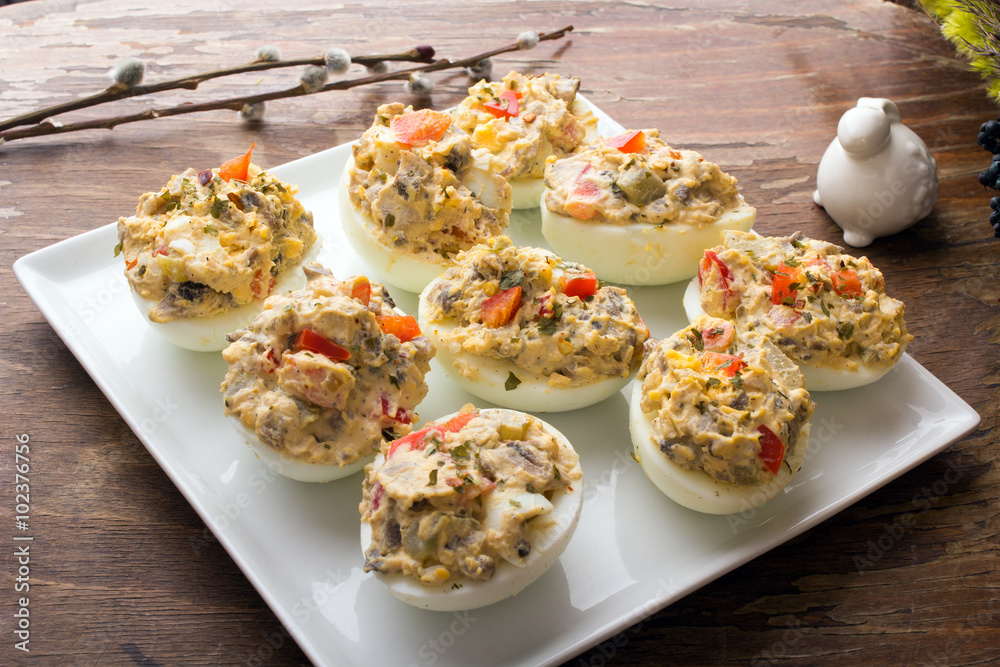 stuffed eggs with peppers, mushrooms and herbs - selective focus stuffed eggs with peppers, mushrooms and herbs - selective focus