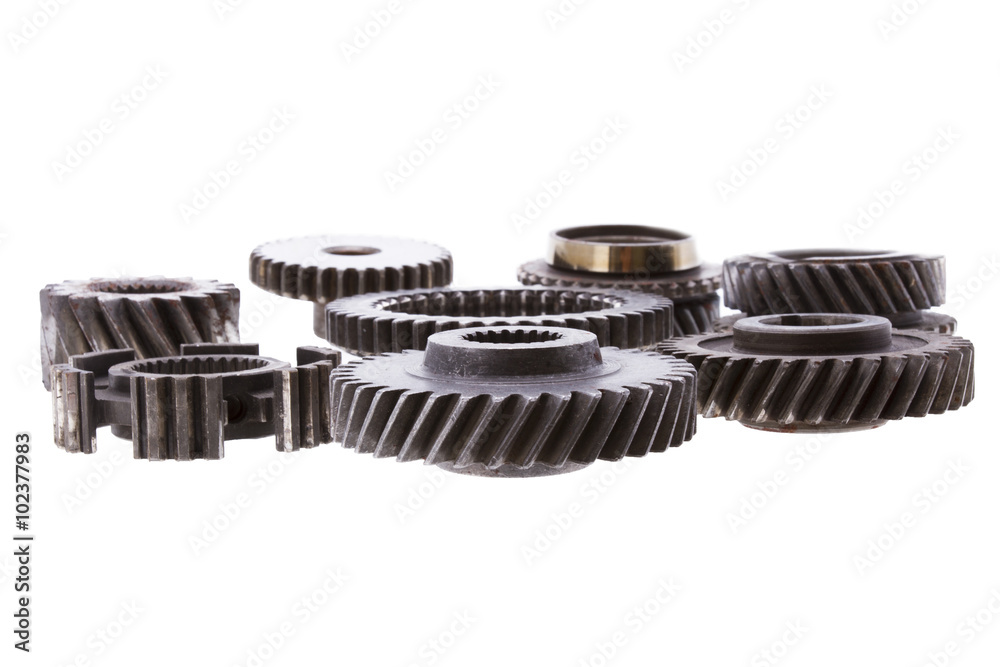 Group of rusty transmission gears isolated on a white background Group of rusty transmission gears isolated on a white background
