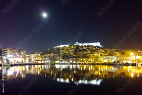 Amazing night photo of Kavala and moon over old town, East Macedonia and Thrace, Greece