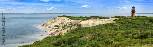 Panorama of a Gay Head lighthouse on a cliff in Aquinnah, Marthas Vineyard photo