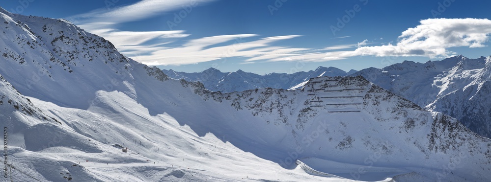 Fototapeta Snowy mountain range panorama