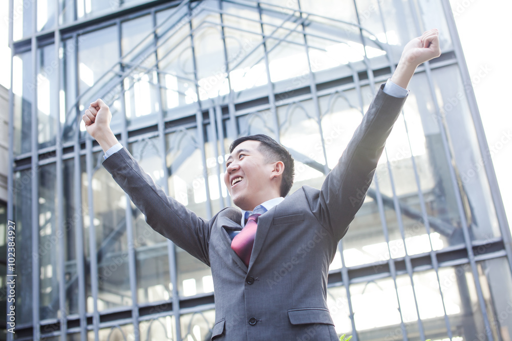Young Business Person with raised arms screaming Young Business Person with raised arms screaming