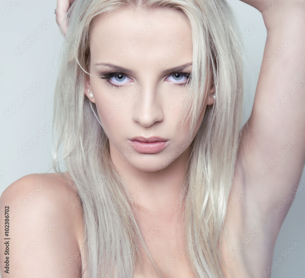 Fototapeta premium beautiful young woman with flawless skin and perfect make-up