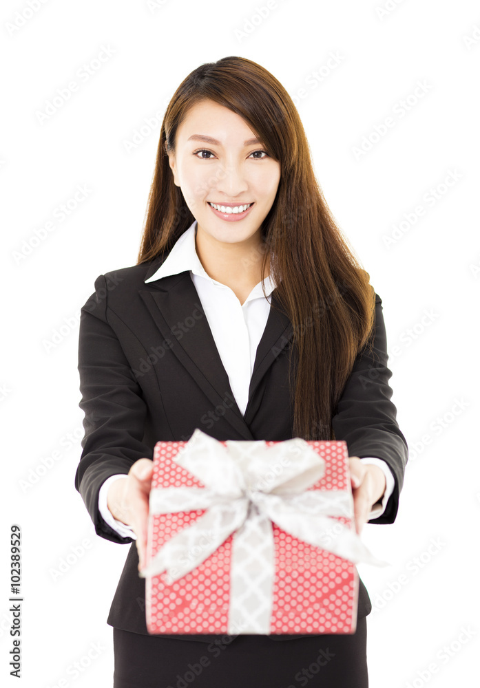 young smiling businesswoman showing the gift box young smiling businesswoman showing the gift box