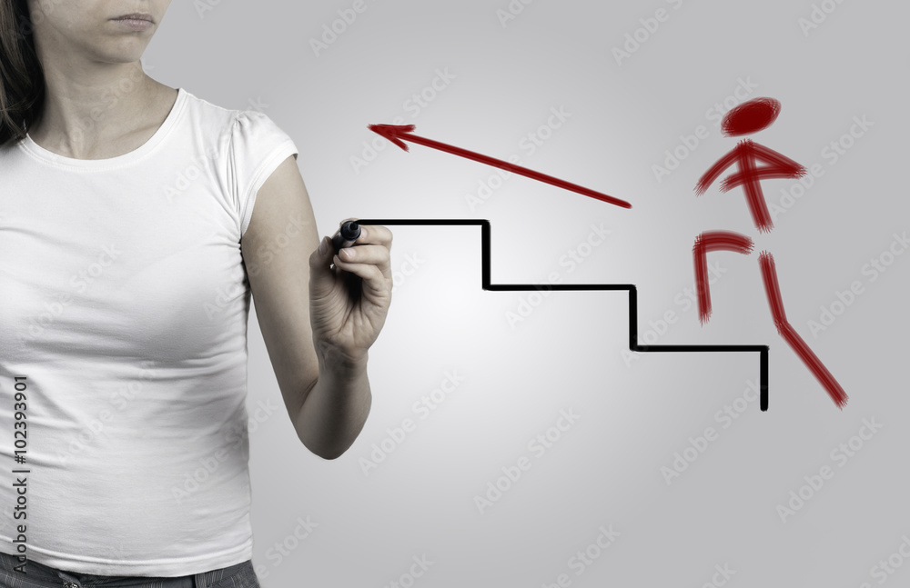 Beautiful woman writing - career ladder concept Beautiful woman writing - career ladder concept