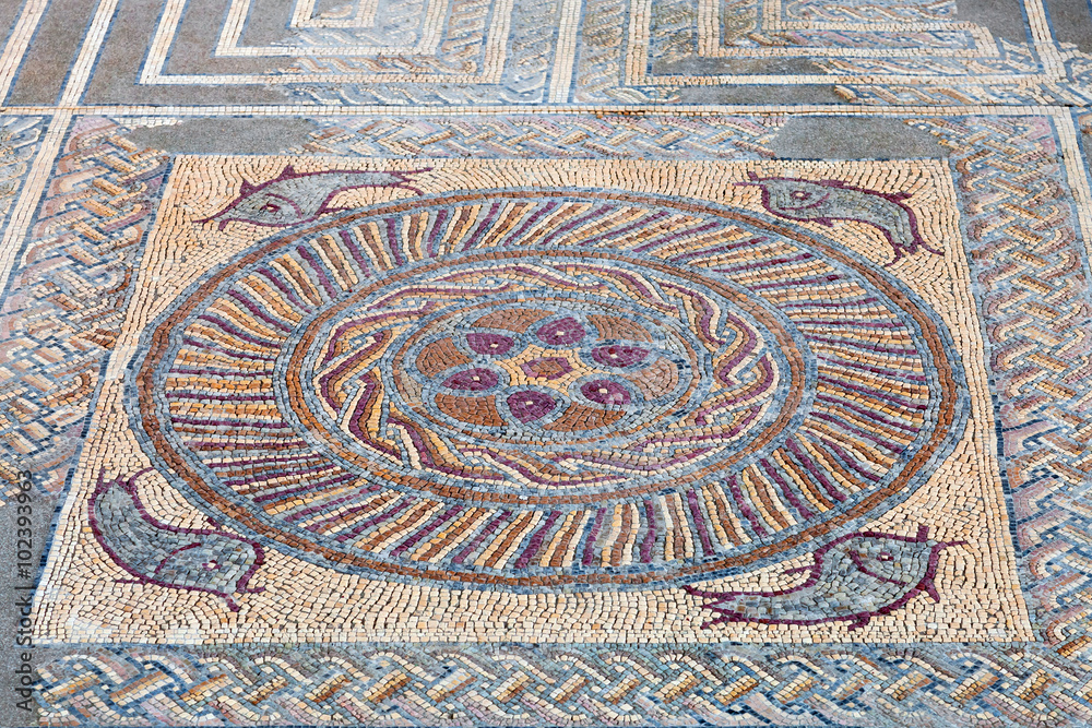 Close-up of a decorative Roman tessera mosaic pavement in the peristyle of the House of Fountains. Conimbriga in Portugal, is one of the best preserved Roman cities on the west of the empire.