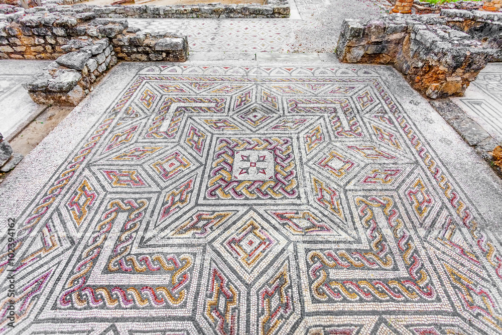 Complex and elaborate Roman tessera mosaic pavement in the House of the Swastika. Conimbriga in Portugal, is one of the best preserved Roman cities on the west of the empire.
