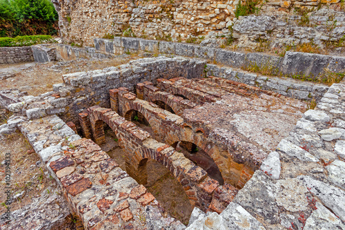Hypocaust structure used to heat the water of the Caldarium room in the Roman Baths of the Wall. Conimbriga in Portugal, is one of the best preserved Roman cities on the west of the empire. photo