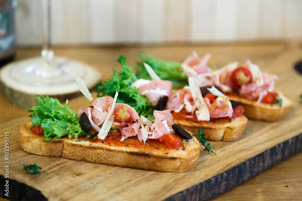 toasted bread slice with smoked ham and cheese