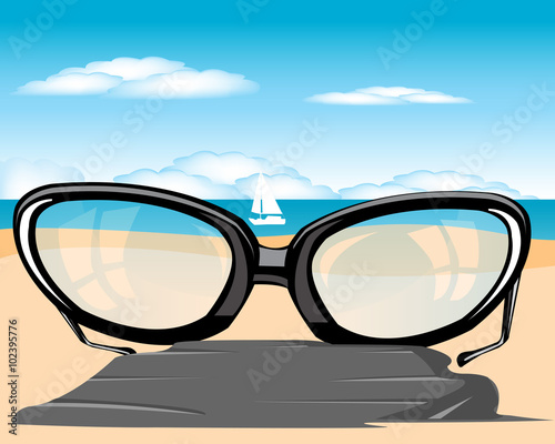 Spectacles on beach