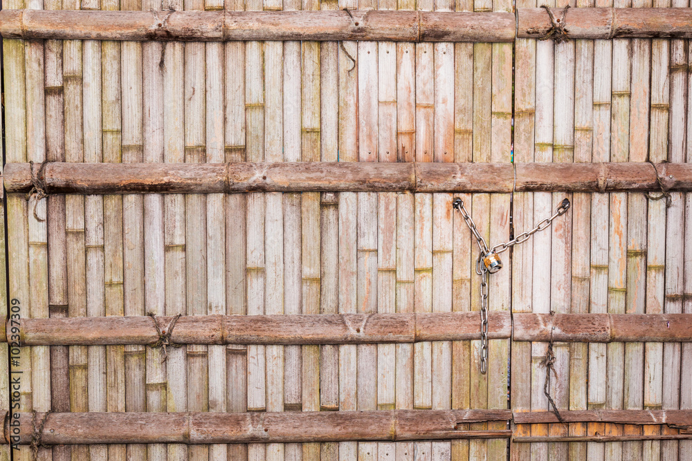 Bamboo texture with chain locked key. Bamboo texture with chain locked key.