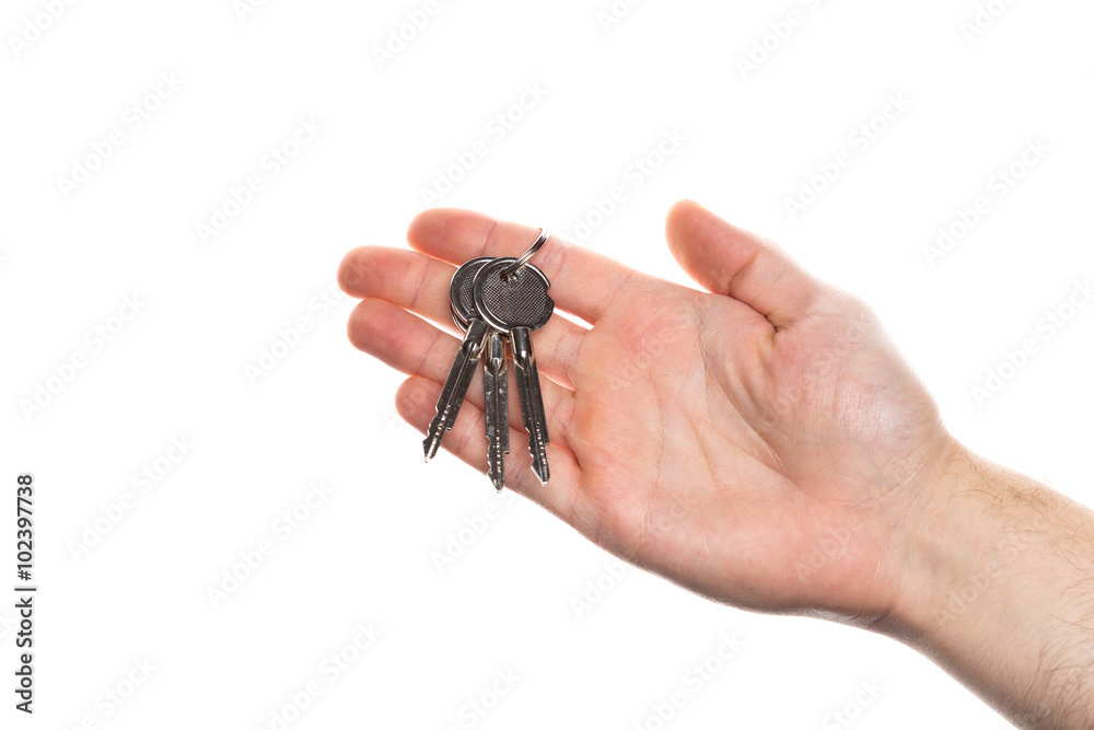 Human hand holding key