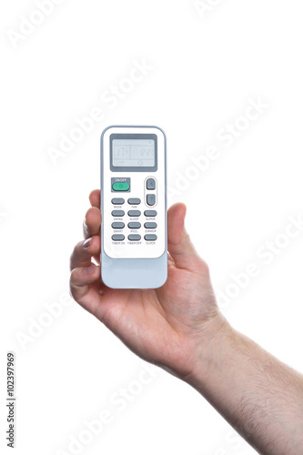 Wallpaper Mural Hand holding a remote controller Torontodigital.ca