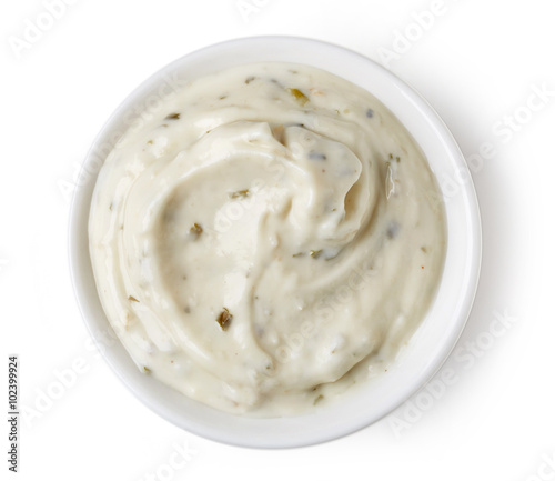 Tableau sur toile Mayonnaise in round dish on white background