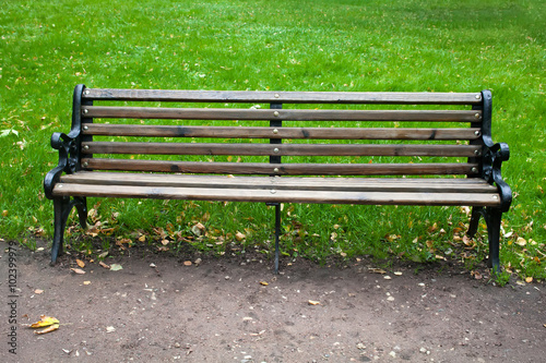 Vintage wooden bench in park
