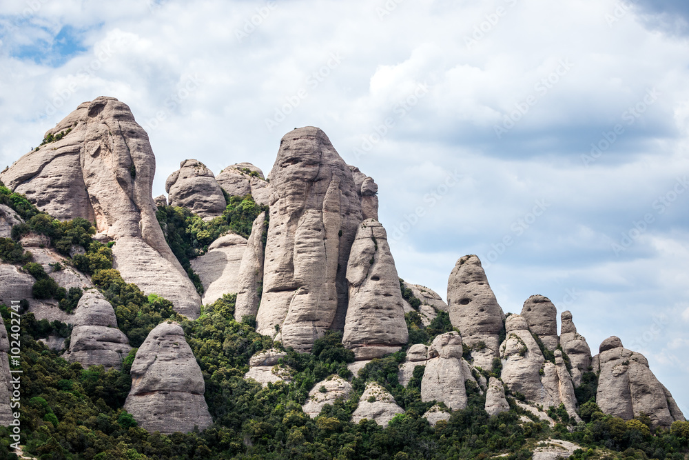 Conglomerate rocks in Montserrat mountains near Maria de Montserrat Abbey, Spain