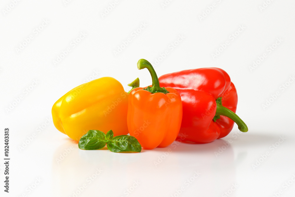 three ripe bell peppers