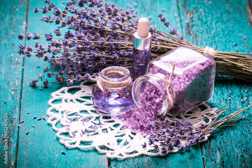 Fototapeta Naklejka Na Ścianę i Meble -  Aromatherapy oil and lavender, spa,  on a wooden background
