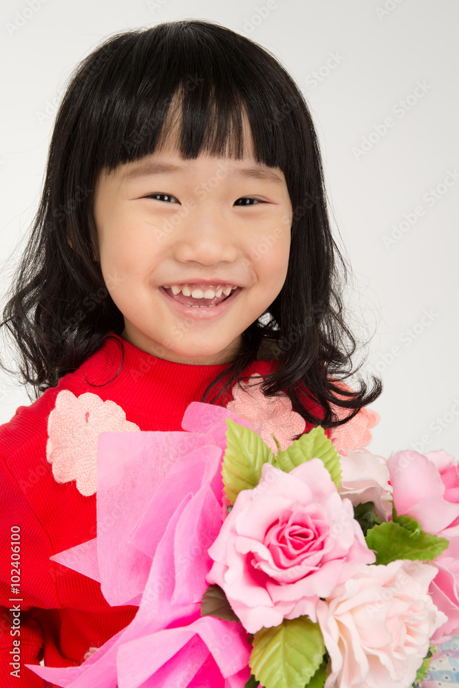 Happy asian child hand holding rose bouquet