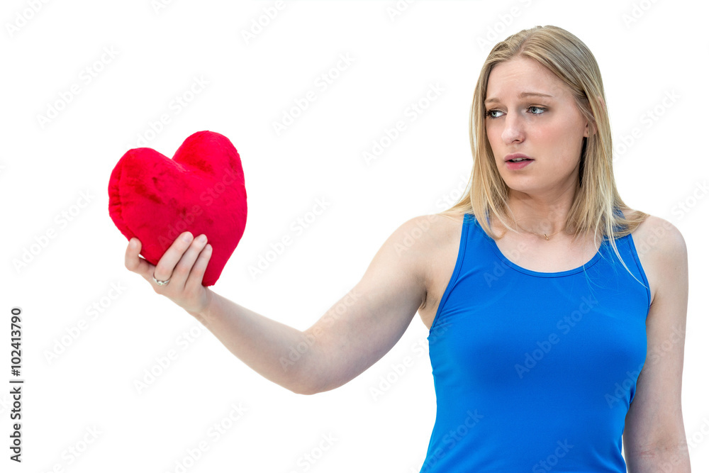 young lonely sad woman holding red valentine heart young lonely sad woman holding red valentine heart