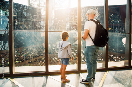 Father and daughter in the first floor of the Eiffel Tower © asife