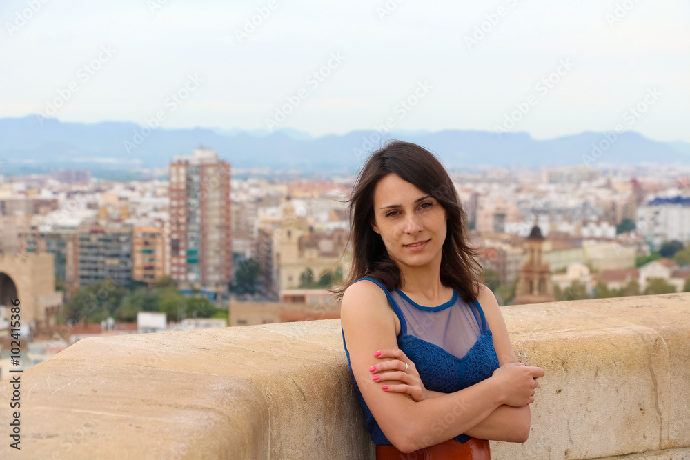 Girl on the background of Valencia, Spain