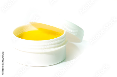 Nourishing cream with marigold extract in small pack isolated on