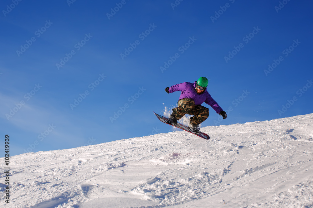 Snowboarder jumping Snowboarder jumping