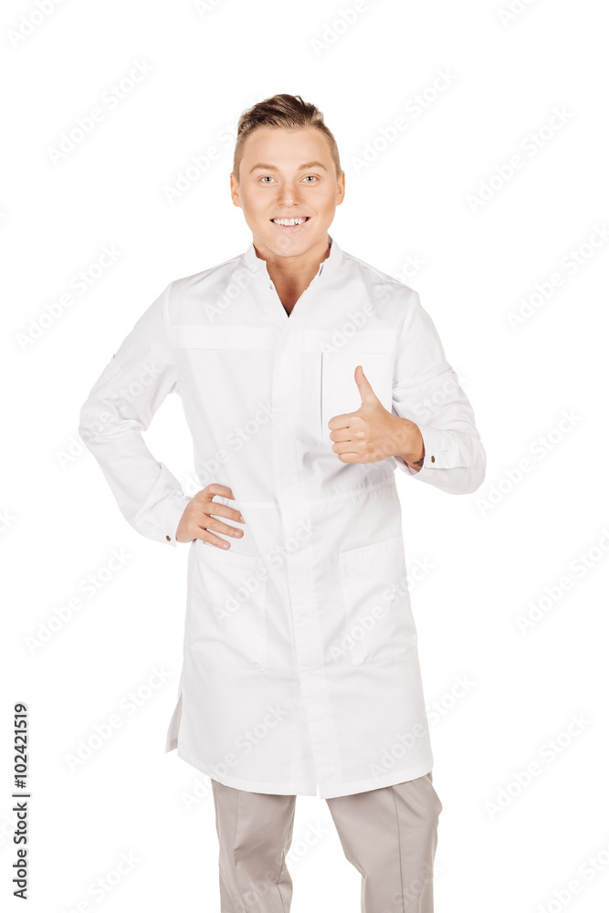 Young male doctor in white coat showing thumbs up. People and me Young male doctor in white coat showing thumbs up. People and me