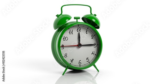 Retro green alarm clock, isolated on white background.
