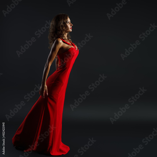 Portrait of Beautiful Sensual Woman in Fashion Red Dress. 